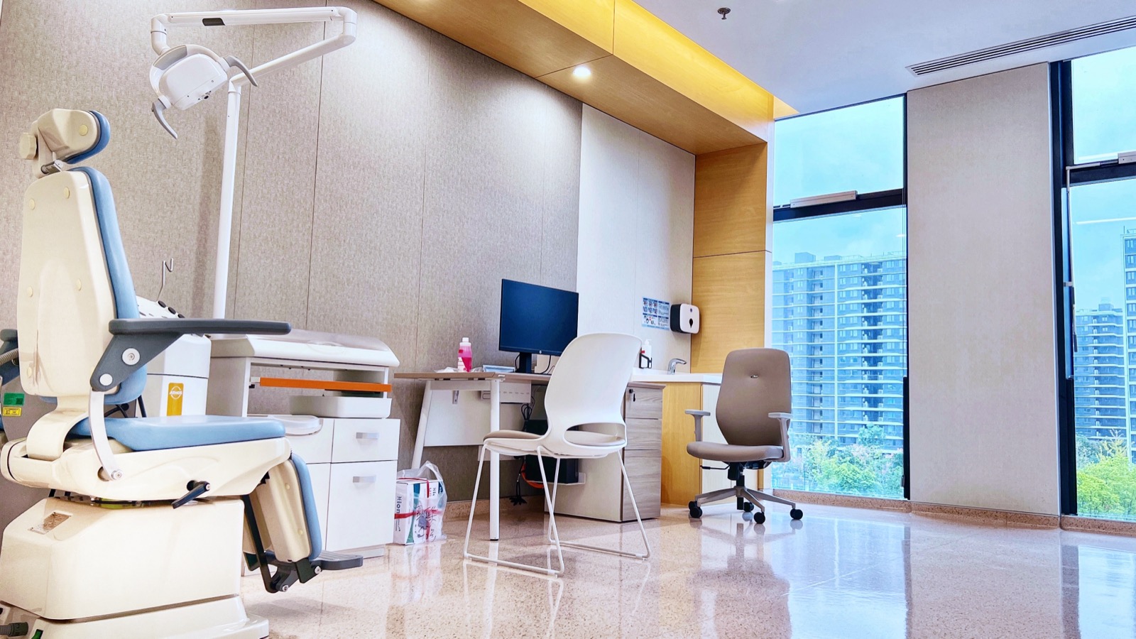 A specialist examination room with city views